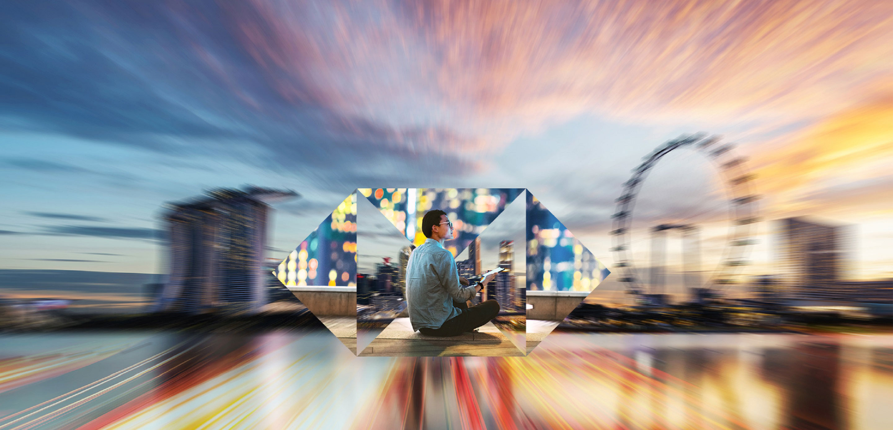 A businessman sitting in the city with HSBC logo in the background